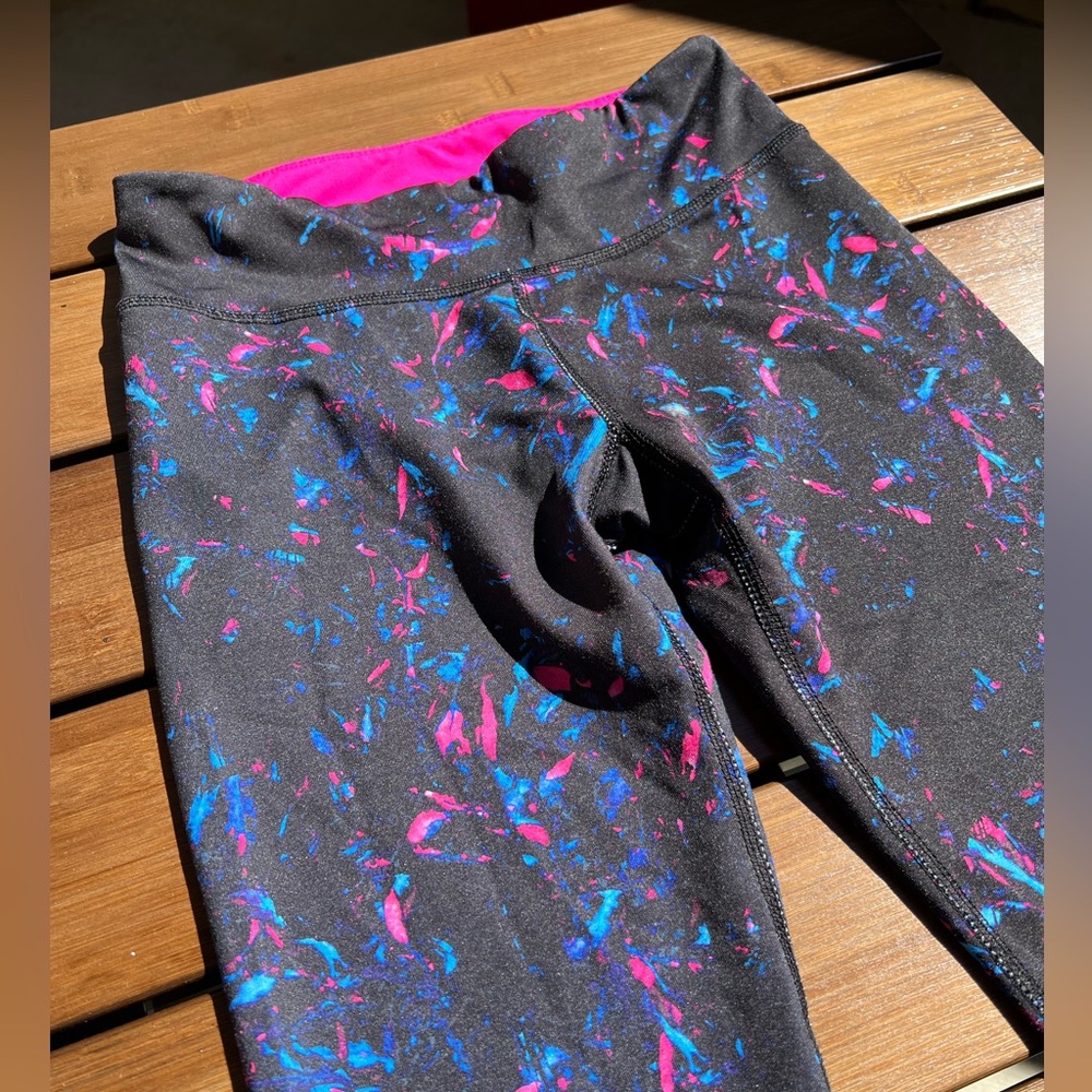LIVELOVEDREAM • Black leggings with neon pink and blue accents all over •Size XS